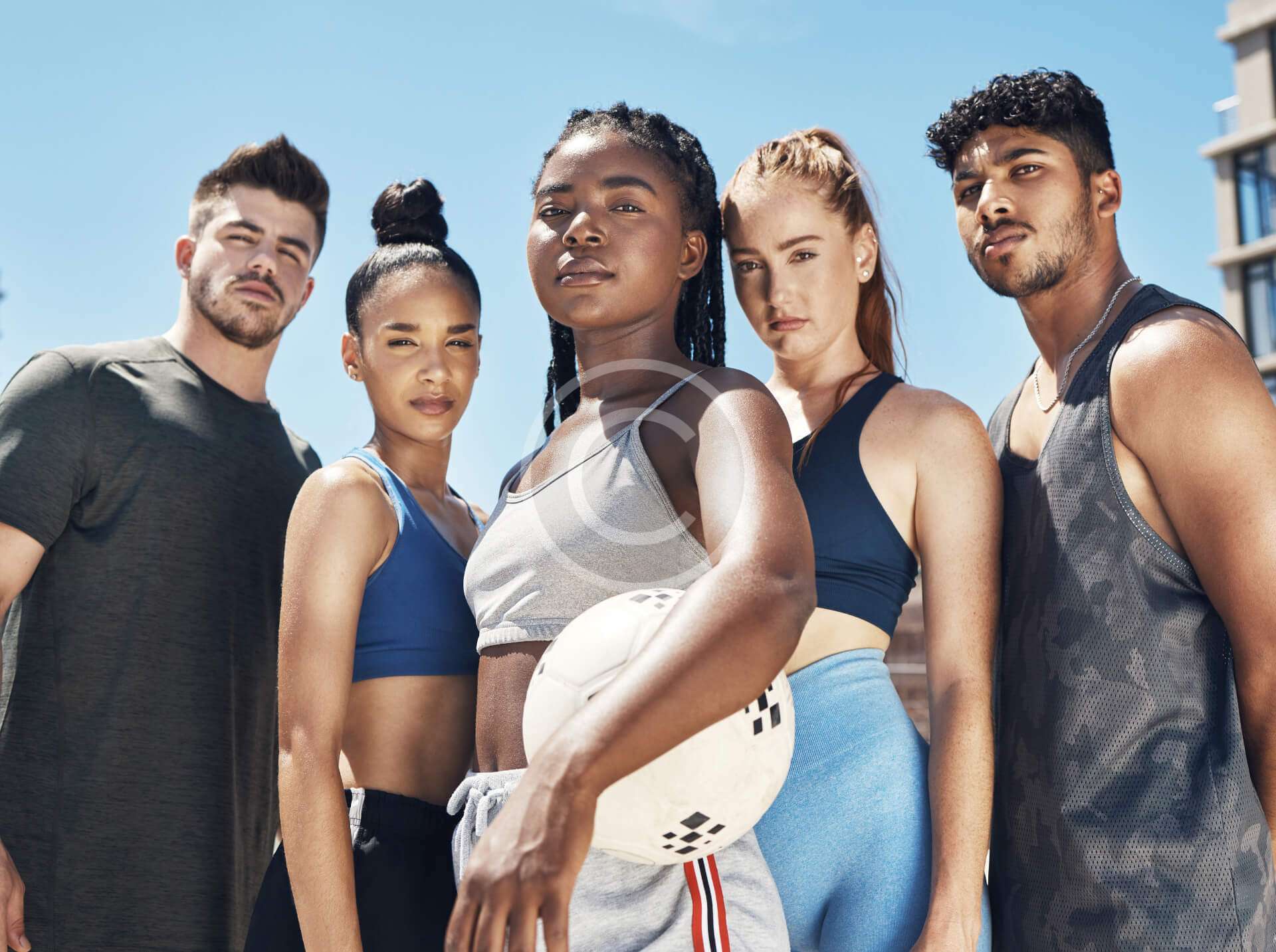 Volleyball players on grass court