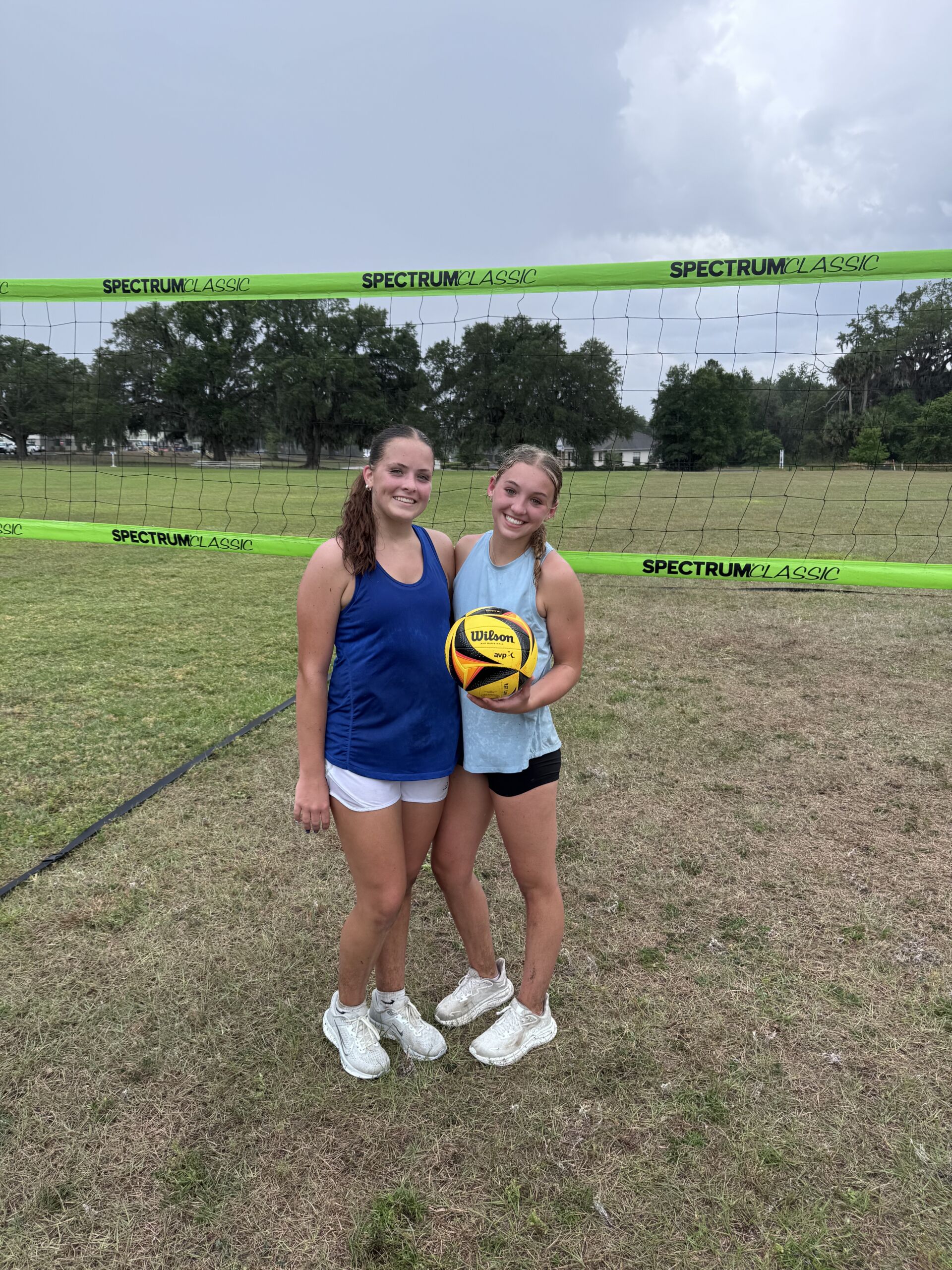 Volleyball players on grass court